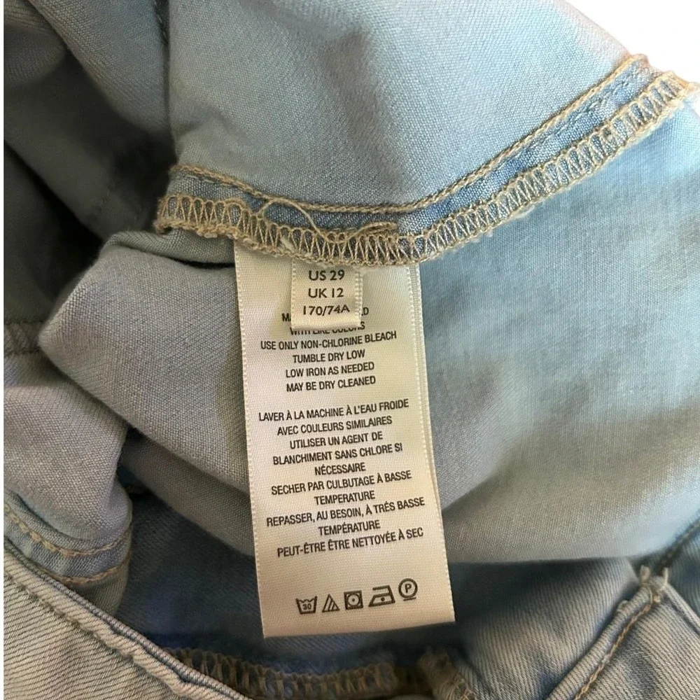 We the Free • Light Wash Flare Jeans • Wide Leg • Frayed Raw‎ Hem • Size 29